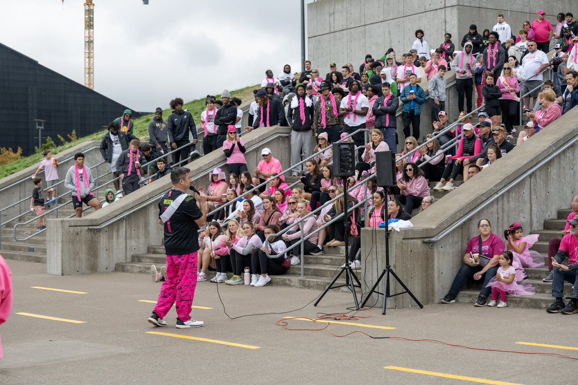 Crowd in pink at an Autzen Stadium Power of Pink rally in Lane County